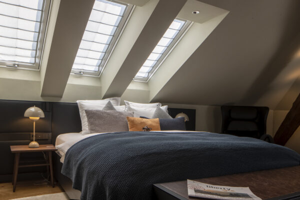 Rooftop Suite Bett - Hotel Liberty
